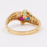 Anello vintage in oro giallo con zaffiro, rubino, smeraldo e diamanti(0.30ct), anni '70