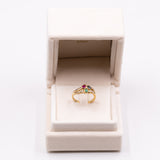 Anello vintage in oro giallo con zaffiro, rubino, smeraldo e diamanti(0.30ct), anni '70