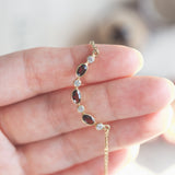 Collana vintage in oro 8K con granati e imitazioni di diamanti, anni '50/'60