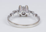 Anello solitario in oro bianco 18k con diamante centrale di 0.55ct, anni 40