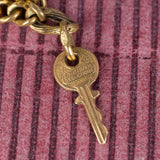 Braccialetto antico in oro 18K con charms, primi del '900