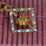 Braccialetto antico in oro 18K con charms, primi del '900