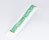 Braccialetto in oro 18k e smeraldi , anni 60