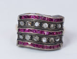 Anello in oro 12k e argento con rubini e rosette di diamante,