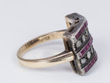 Anello in oro 12k e argento con rubini e rosette di diamante,