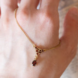 Vintage 8K gold and garnet necklace, 1950s
