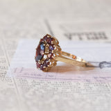 Vintage 8K gold daisy ring with garnets, 1950s / 1960s