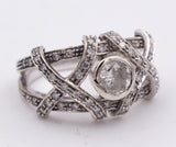 Anello in oro bianco con diamanti centrale contornato di piccoli brillanti .Anni 60 - Antichità Galliera