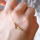 Collana vintage in oro 18K con rubini (0.25ctw ca.) e diamanti (0.25ctw ca.), anni ‘70