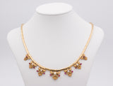 Collier in oro 18k con perline e rubini , anni 60 - Antichità Galliera