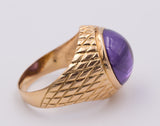 Anello vintage da uomo in oro con ametista cabochon . Anni 40