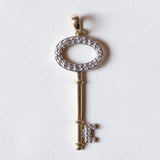 Ciondolo vintage a forma di chiave in oro giallo e in oro bianco 10K con diamanti (0.10ctw ca.), anni '60