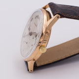 Orologio da polso vintage Movado in oro con calendario completo, 1950