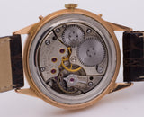 Orologio da polso vintage Movado in oro con calendario completo, 1950