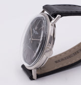 Orologio da polso vintage IWC International Watch Company in acciaio, automatico con data. 1960 circa
