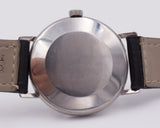Orologio da polso vintage IWC International Watch Company in acciaio, automatico con data. 1960 circa