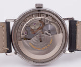 Orologio da polso vintage IWC International Watch Company in acciaio, automatico con data. 1960 circa