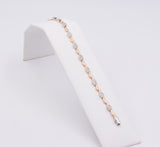 Bracciale in oro giallo e bianco con diamanti a pavé