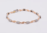 Bracciale in oro giallo e bianco con diamanti a pavé
