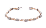 Bracciale in oro giallo e bianco con diamanti a pavé
