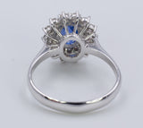 Anello vintage in oro bianco con zaffiro centrale e diamanti