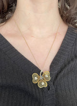 Pendente vintage a trifoglio in oro 18K con diamanti e zaffiri, anni '60