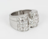 Anello vintage in oro con diamante centrale di 1ct c.a e diamanti laterali, anni 50