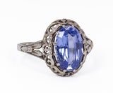 Anello antico in oro 18K con topazio azzurro centrale, anni '30 - Antichità Galliera