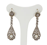 Liberty earrings in gold and silver with diamond and pearl rosettes