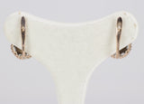 Orecchini antichi in oro a toppa con rosette di diamante. Primi del '900