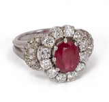 Anello in platino con rubino centrale ( 2.5 ct ) con diamanti taglio brillante (1.2 ct ). Anni 60