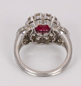 Anello in platino con rubino centrale ( 2.5 ct ) con diamanti taglio brillante (1.2 ct ). Anni 60