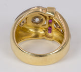 Anello vintage in oro 18k con diamante centrale (1.28ct) e laterale (0,15ct) e pavè di diamanti e rubini, anni 70