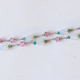 Collana vintage in oro bianco 18K con opali, smeraldi e quarzi rosa, anni '70