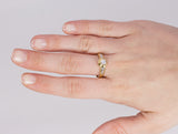 Anello vintage in oro 18k con diamante centrale ( 0.3ct circa ) e diamanti laterali, anni 60