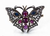 Broche papillon vintage en or 18 carats et argent avec diamants, saphirs et rubis. années 1950