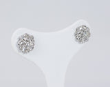 Boucles d'oreilles en or 18 carats avec diamants centraux (0,50 ct) et rosettes, années 1950