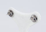 Boucles d'oreilles en or 18 carats avec diamants centraux (0,50 ct) et rosettes, années 1950