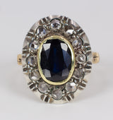 Anello vintage in oro 18k e argento con zaffiro centrale e rosette di diamante laterali, anni 50