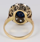 Anello vintage in oro 18k e argento con zaffiro centrale e rosette di diamante laterali, anni 50