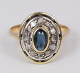 Anello vintage in oro 18k con zaffiro centrale e rosette di diamante, anni 40