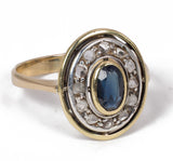 Anello vintage in oro 18k con zaffiro centrale e rosette di diamante, anni 40