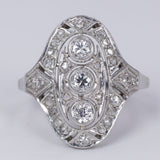 Anello Art Decò in platino con 3 diamanti taglio vecchio (0.30 ct) e rosette, anni 30