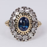Anello vintage in oro e argento con zaffiro centrale e rosette di diamante, anni 40