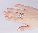 Anello Art Decò in platino con 3 diamanti taglio vecchio (0.30 ct) e rosette, anni 30