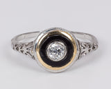 Antique solitaire ring in 18k white gold with central 0.20 ct diamond and onyx, 1930s