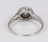 Antique solitaire ring in 18k white gold with central 0.20 ct diamond and onyx, 1930s