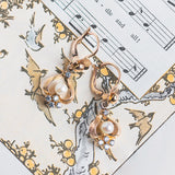 Orecchini vintage in oro 18K con perla e spinelli azzurri, anni '60