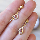 Orecchini vintage in oro 18K con rubini, anni '60/'70
