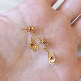 Orecchini vintage in oro 18K con rubini, anni '60/'70